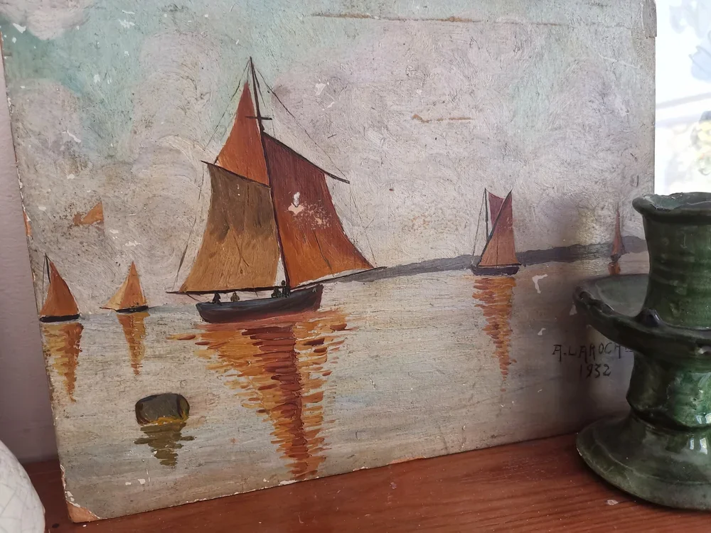 Coastal-themed French painting from 1932 showing sailboats and reflections.