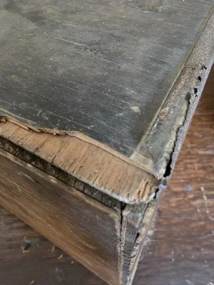Close-up of corner joint and rustic wear on crate edge