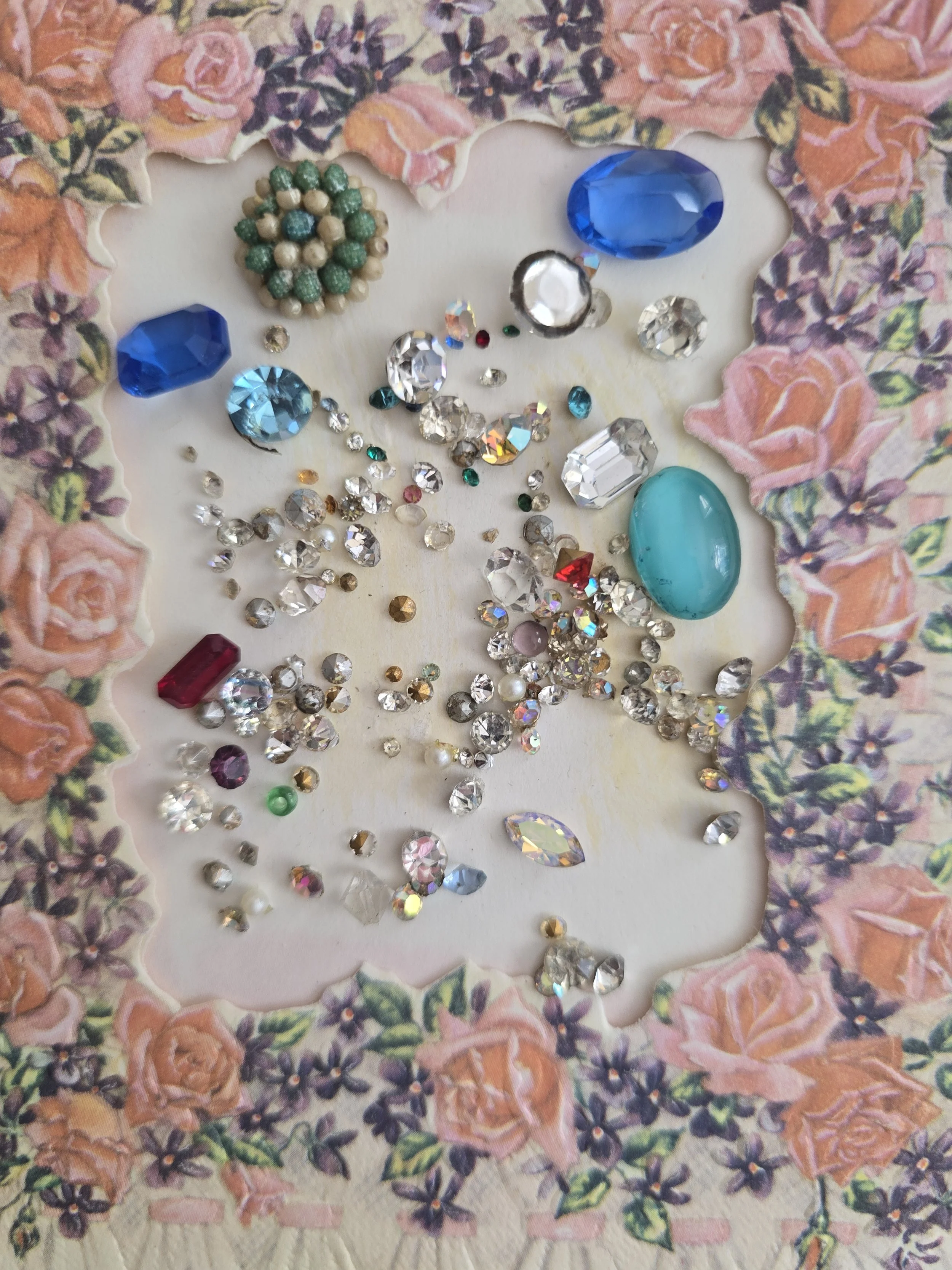 Mixed collection of vintage rhinestones and colourful glass cabochons.