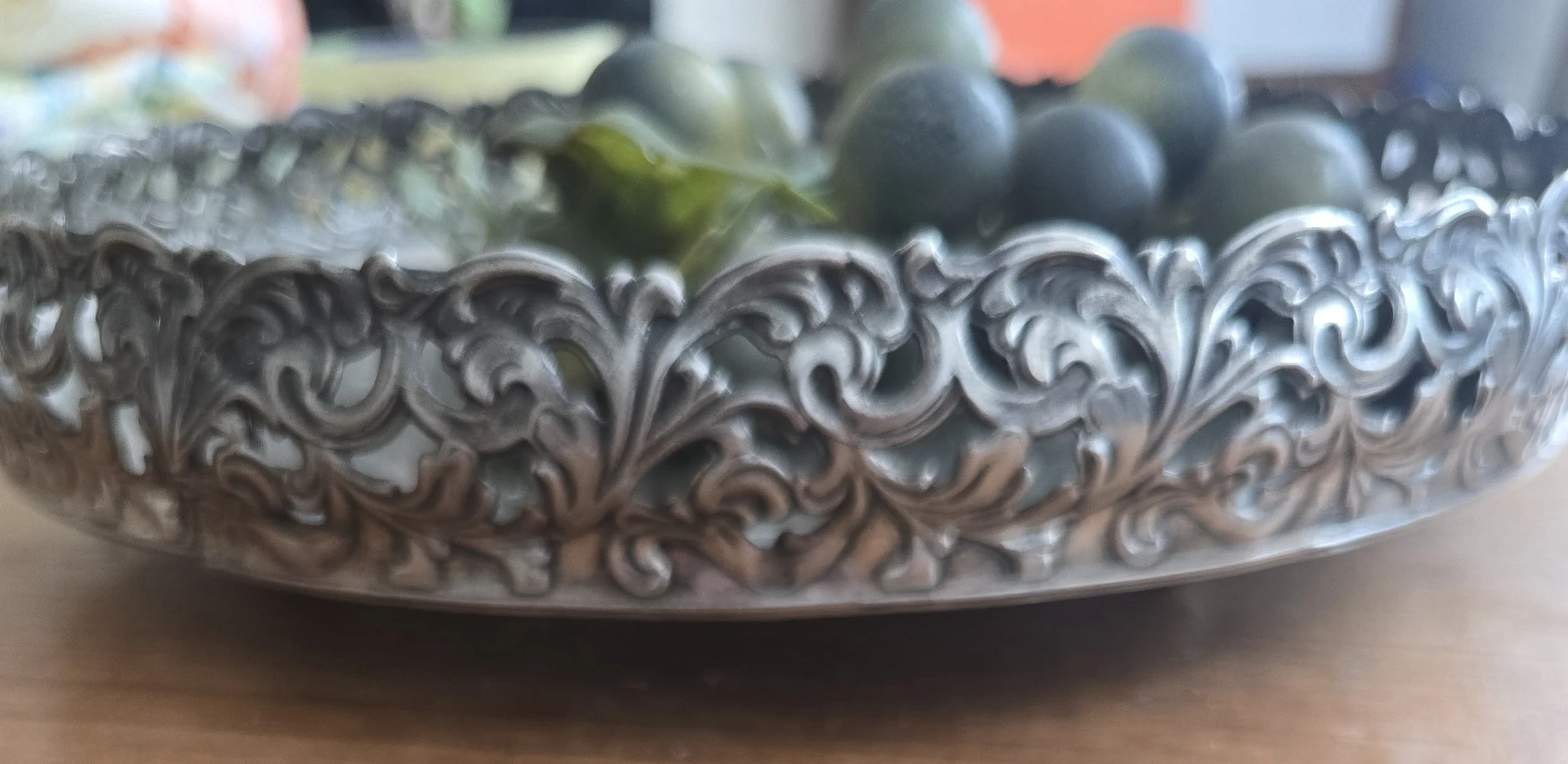 Ornate vintage serving tray styled with decorative grapes