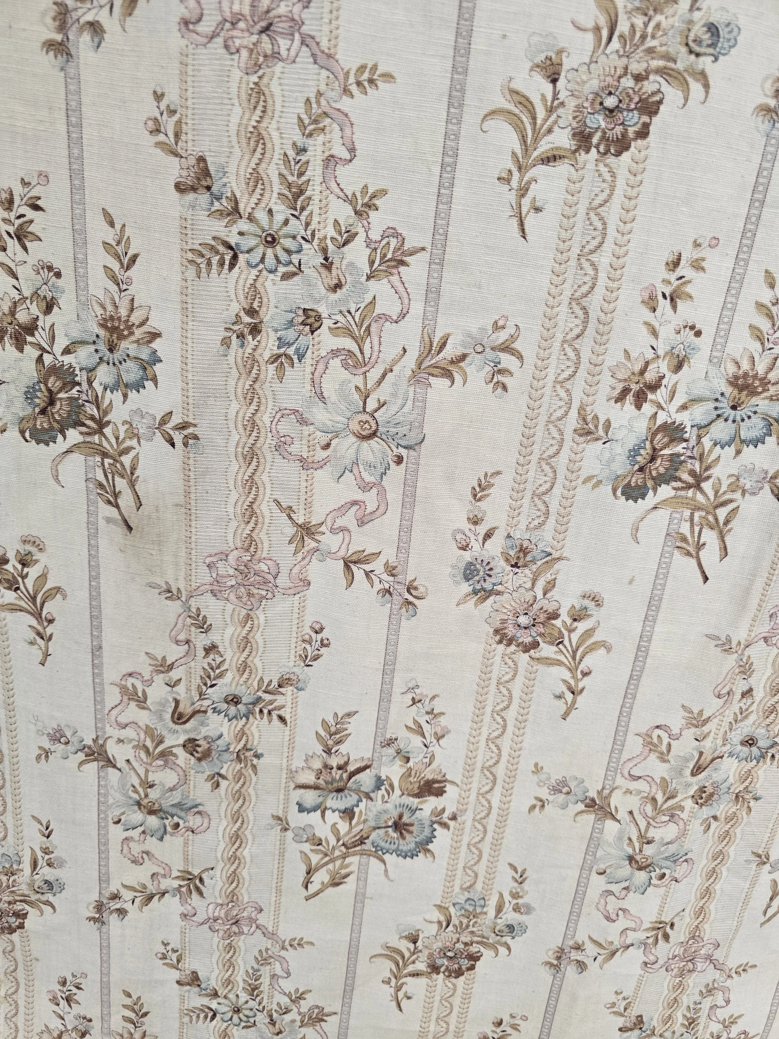 Faded French floral textile with vertical braided stripes and scattered flowers