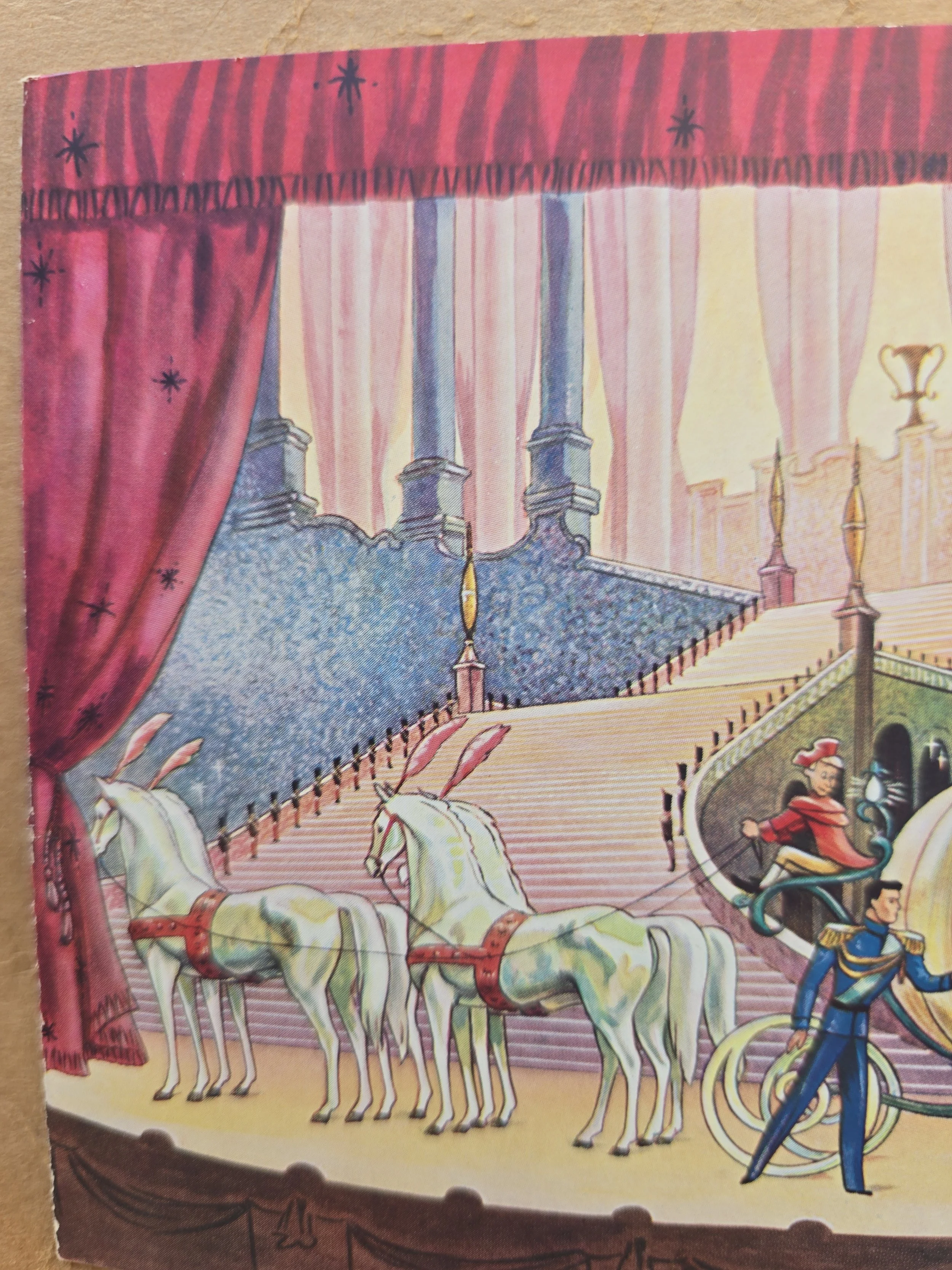 Detail of Cinderella stepping from a pumpkin carriage on a vintage Christmas card