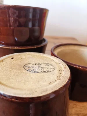 Side view of Moira Pottery ramekin in rustic chestnut brown glaze