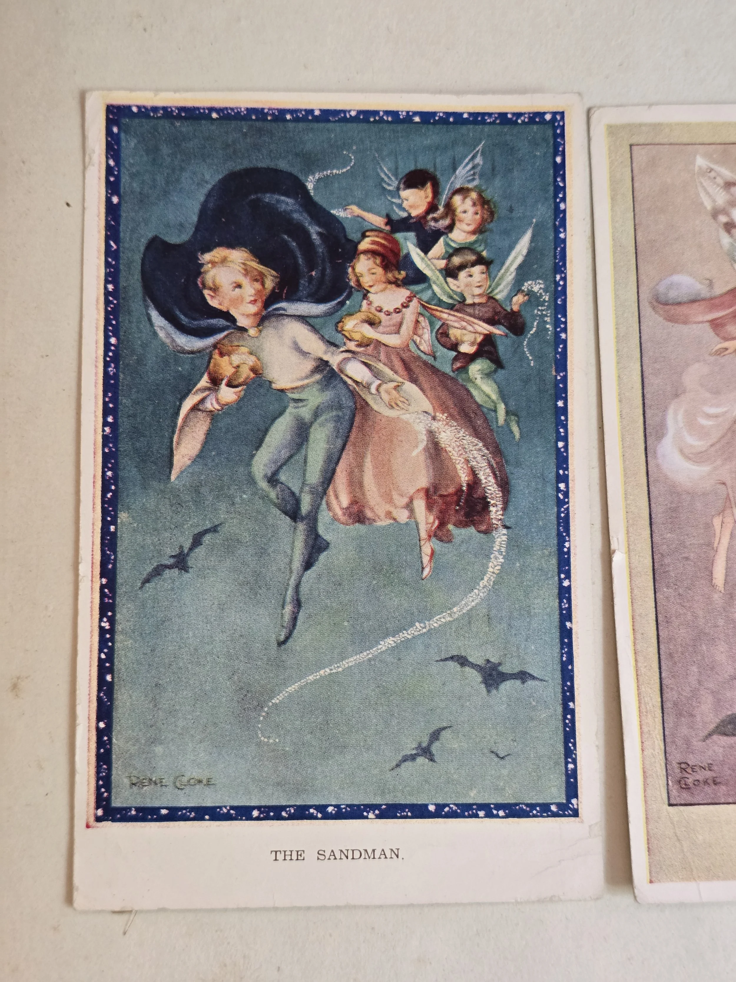 Vintage René Cloke illustrated cards with fairies flowers and dreamlike scenes