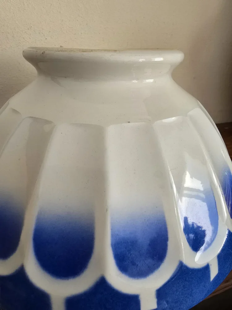 Detail showing rim nibble and soft gradient stencil on vintage French bowl