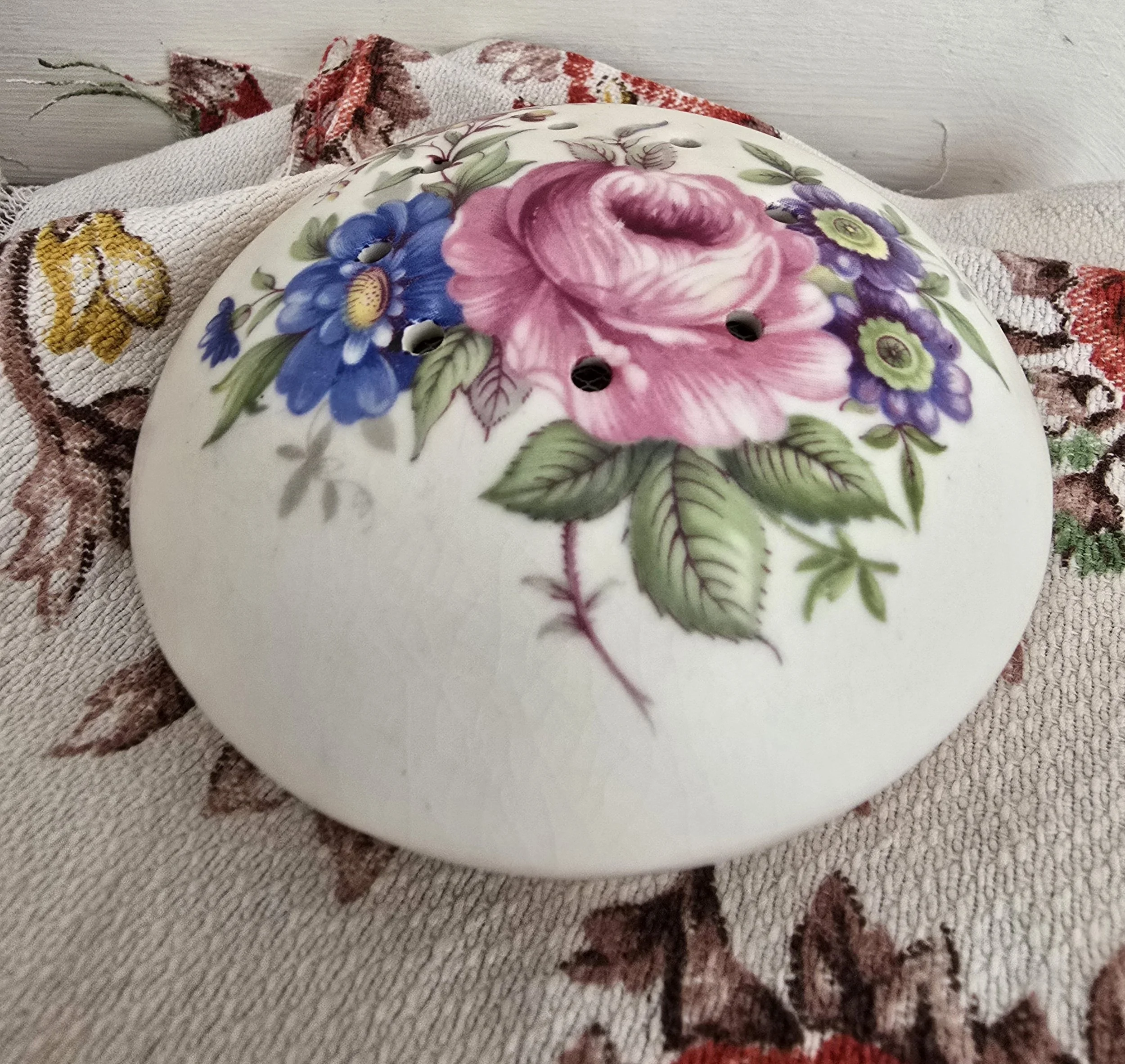 Vintage floral ceramic pomander with pierced top and large rose motif