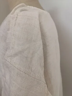 Back view of antique chemise de nuit with monogrammed initials and drawstring neckline