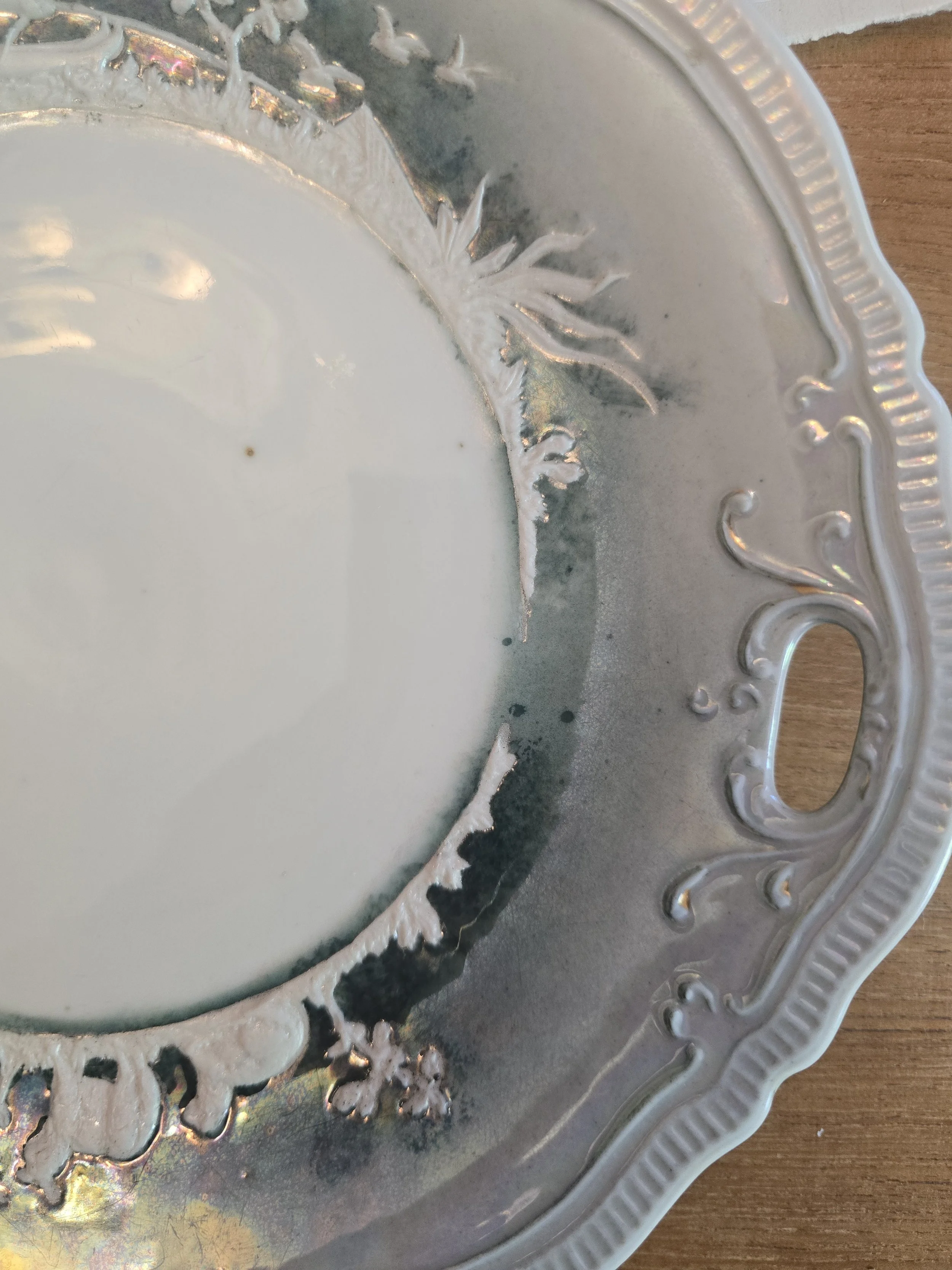 Scalloped edge and pierced handle detail on 29 cm German ceramic plate