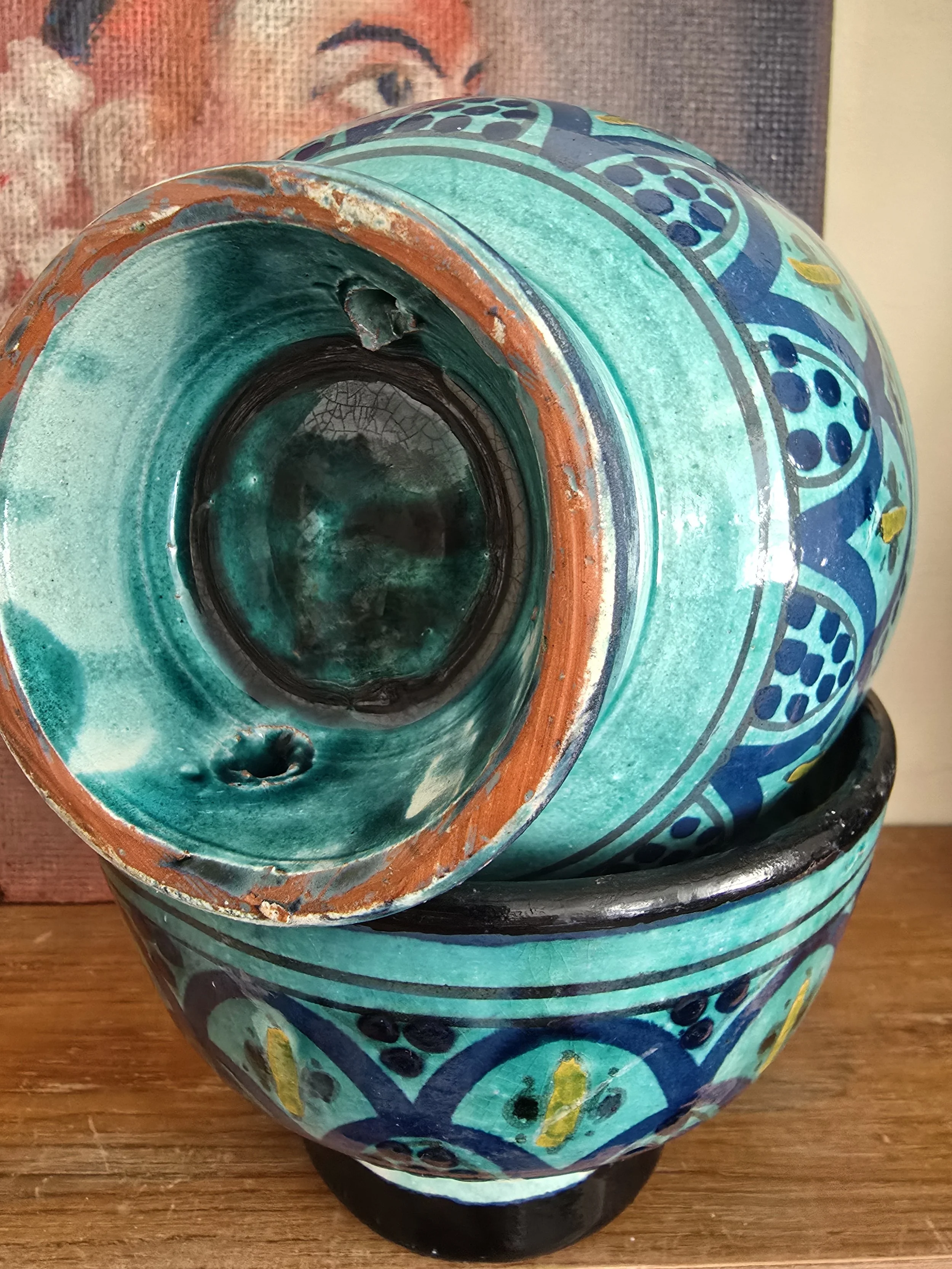 Underside view of Tunisian Zlafah bowl showing red clay base and glaze crackling