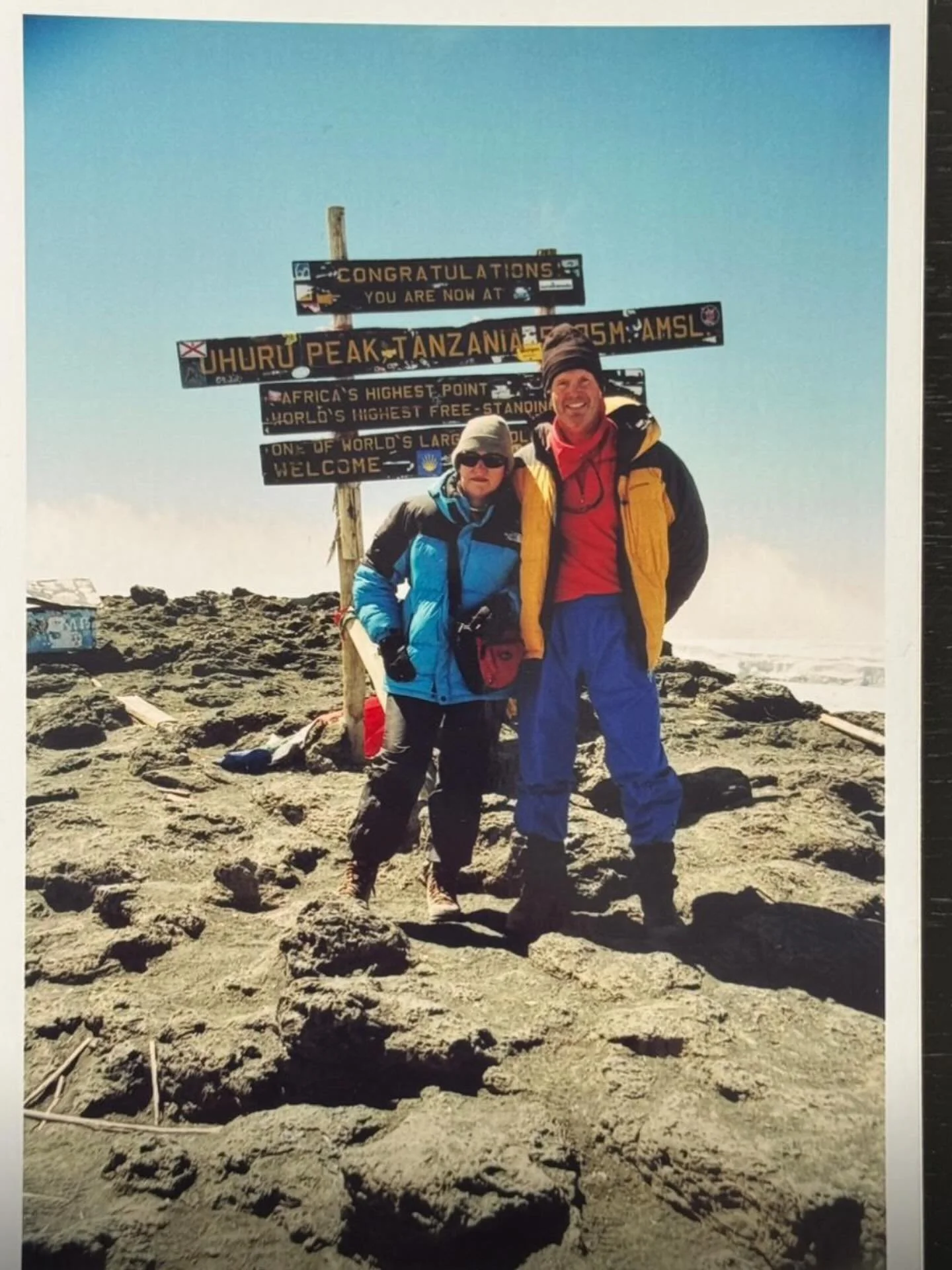 This was in 2008. Jim’s head is obscuring the height of this mountain on the sign board, but I will never forget it: 5895 metres asl (no wonder I look so dazed.)