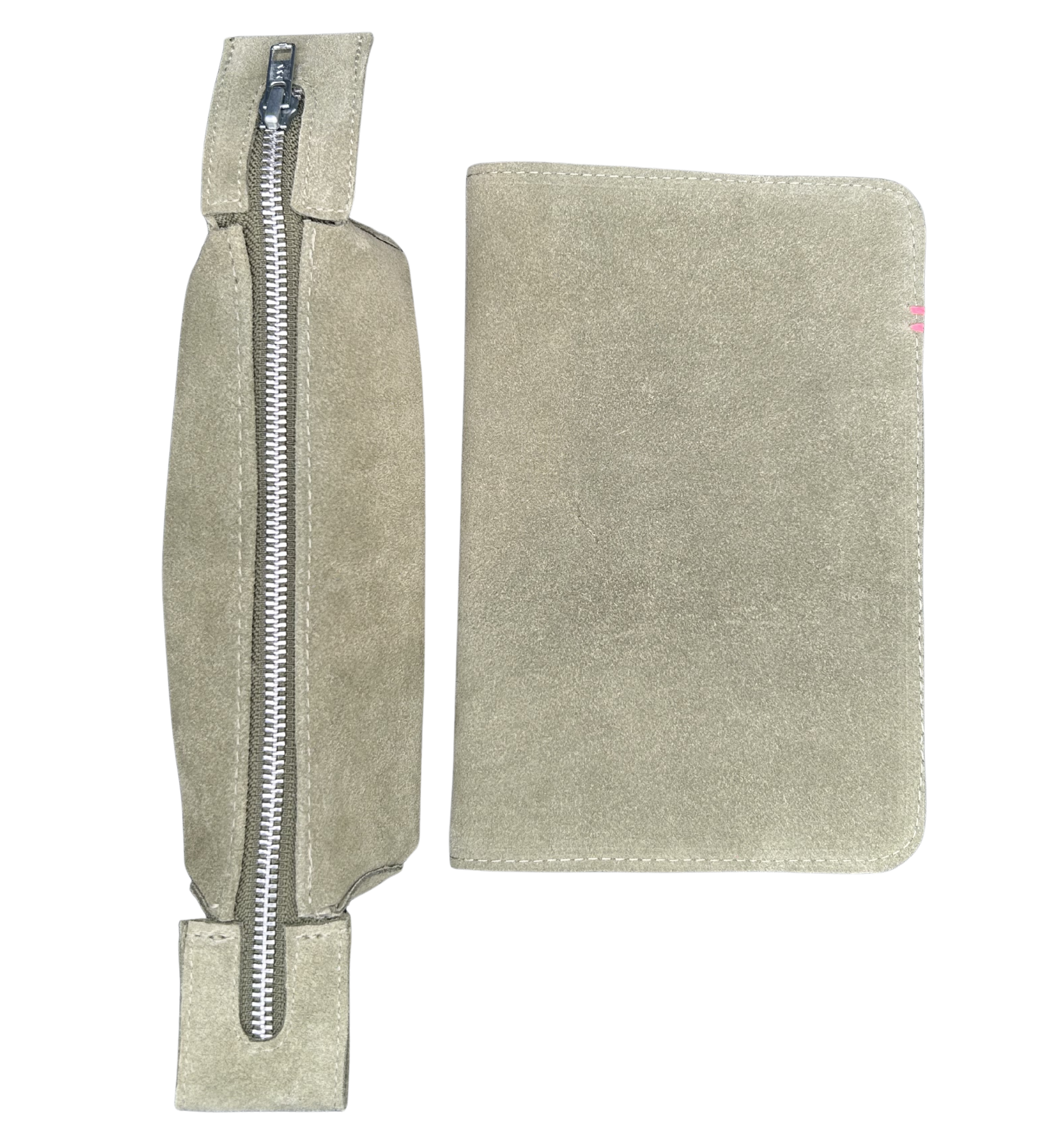 Sage suede leather pencil bag on top of a lilac A5 journal.