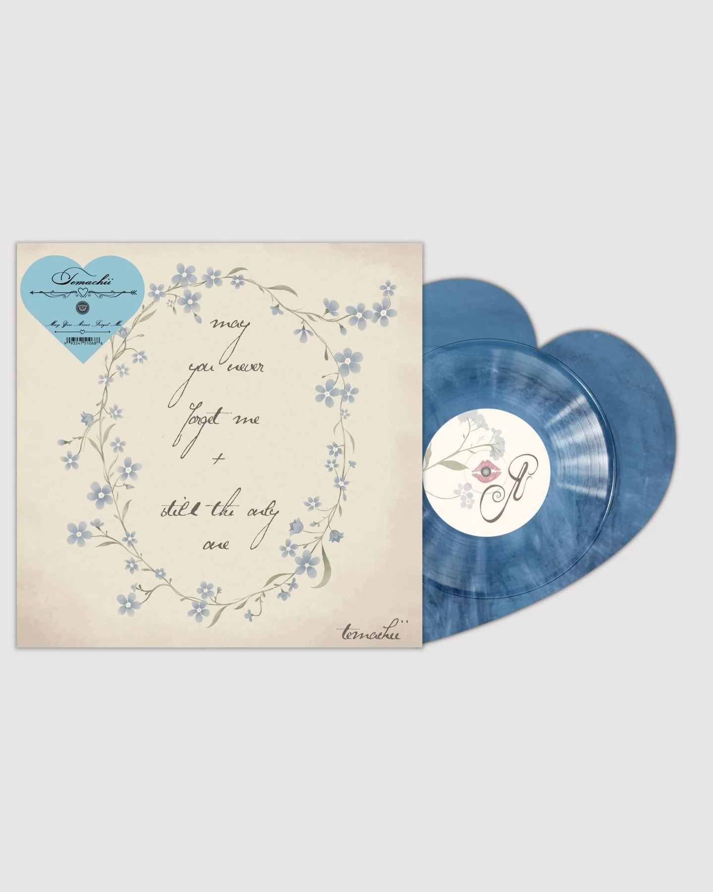 @vertigo.vinyl x @temachii 

VV Exclusive: may you never forget me / still the only one (demo) by temachii 

Pressed on a blue eye swirl marble heart shaped vinyl with brand new artwork, this release is available for 7 days, or while supplies last. T