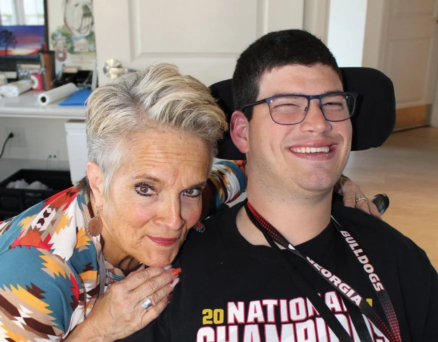 Champions Place staff, Kat Blackburn posing with Champions Place resident, Matthew Dooley.