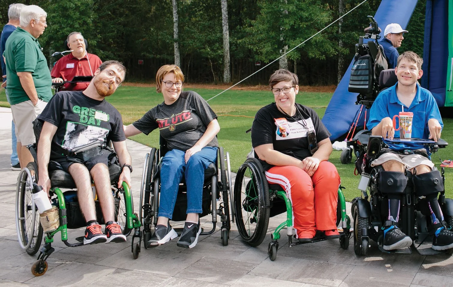 Champions Place residents gathered for a photo during a PGA Tour Superstore hosted event at Champions Place. The residents featured are: Luke Shepherd, Alison Schwab, Sarah Grace, and Corey Barbee.