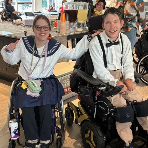 Champions Place residents, Noelle Ford and Corey Barbee, dressed up as characters from The Little Rascals movie (Alfalfa and Darla) for the annual Titan Halloween party.