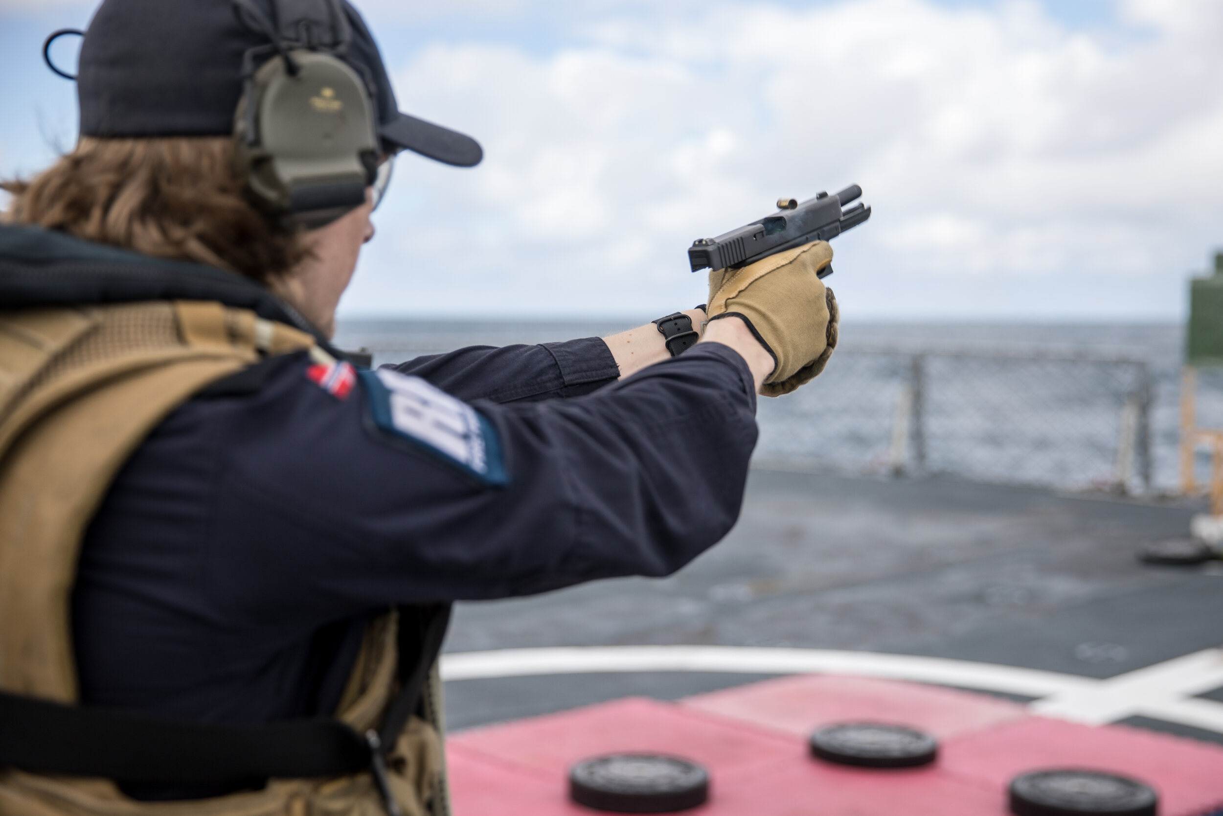  A sailor practices with his Glock P80 sidearm during Exercise Dynamic Mongoose, 2017 