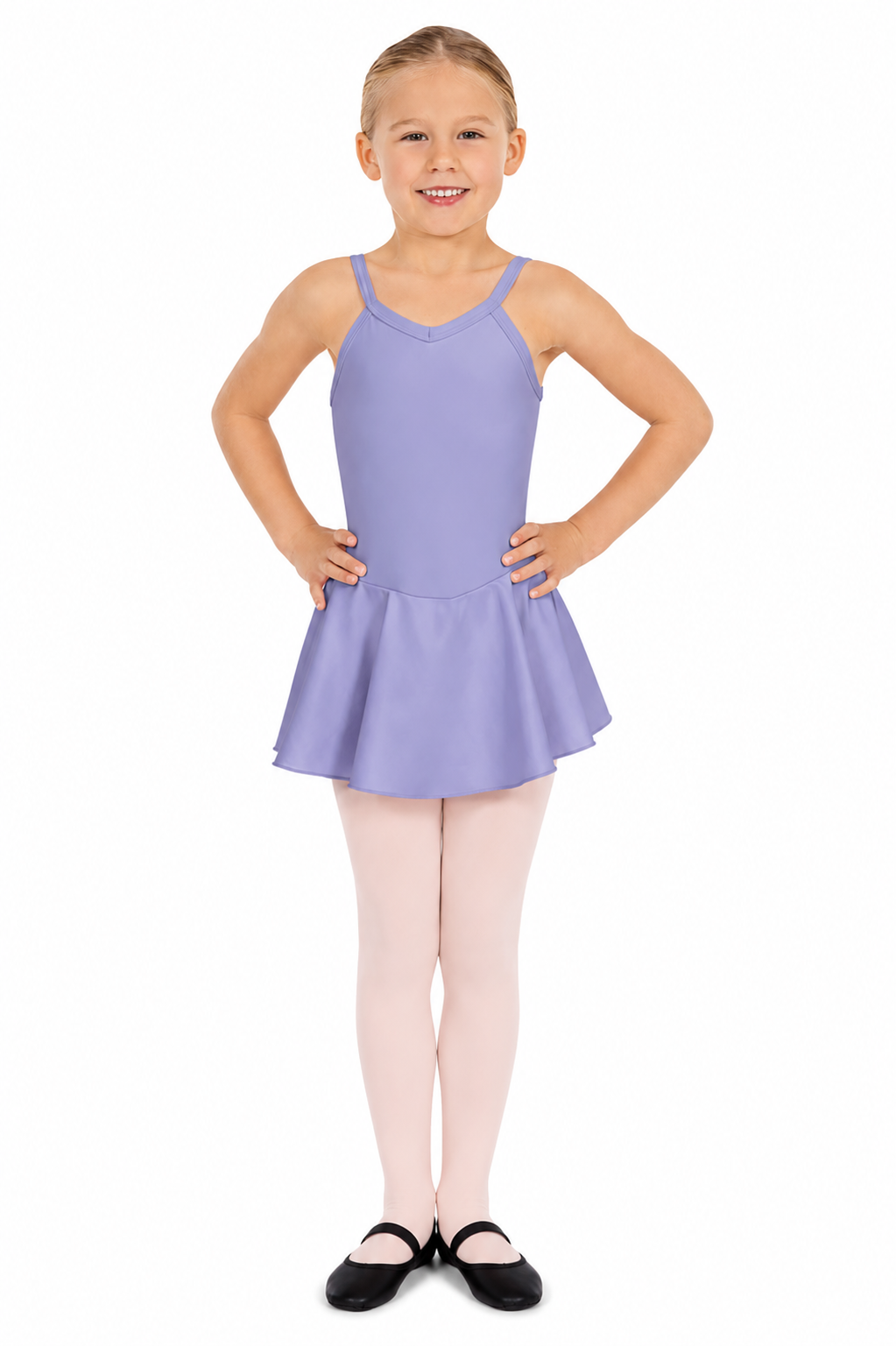 A young girl in a blue dance leotard and skirt, smiling with hands on hips.