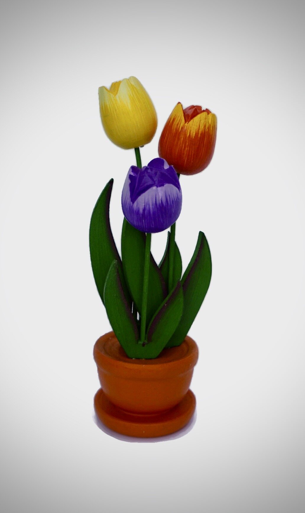 3 Tulips in a pot Org pur yel.jpeg