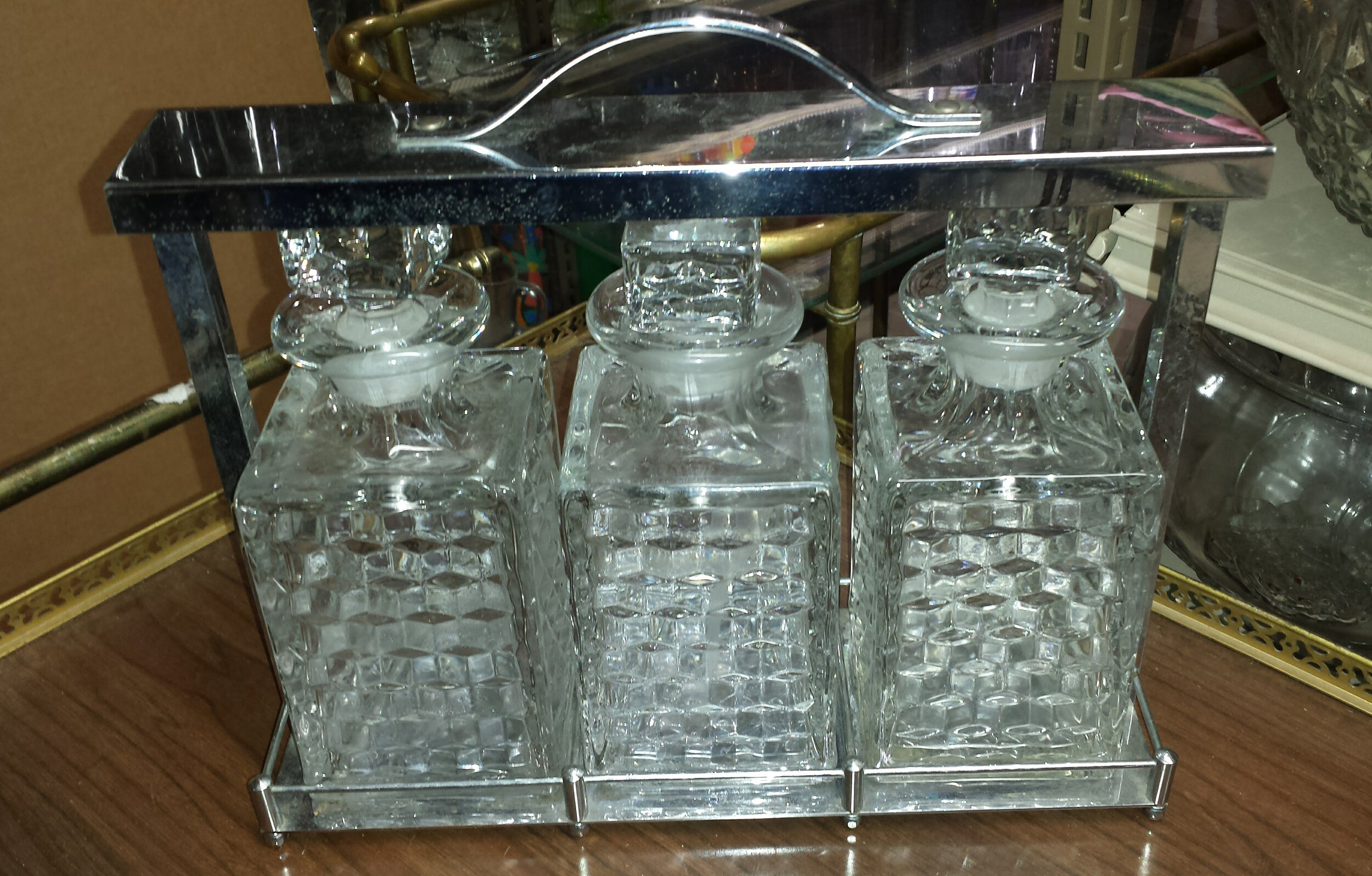 Rectangular Crystal Decanter in a Chrome Carrier.jpg