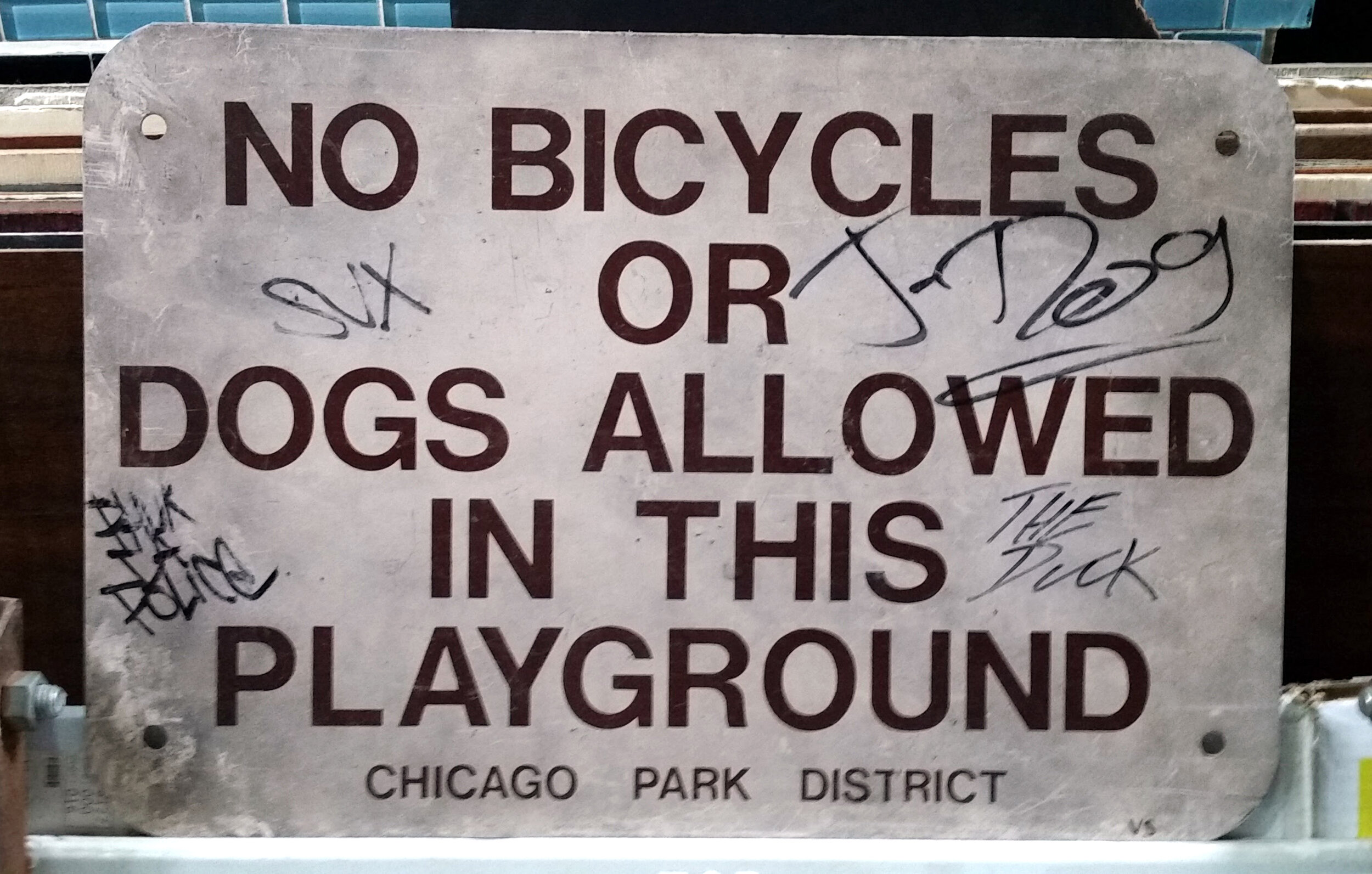 No Bikes or Dogs Allowed in the Playground Sign .jpg