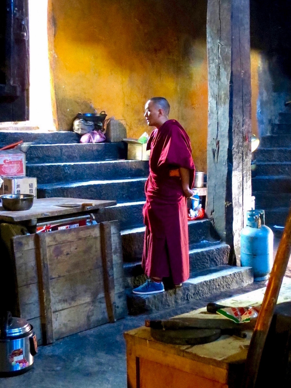 Young monk in kitchen Geo-portrait_©HowardWolff-1.jpg