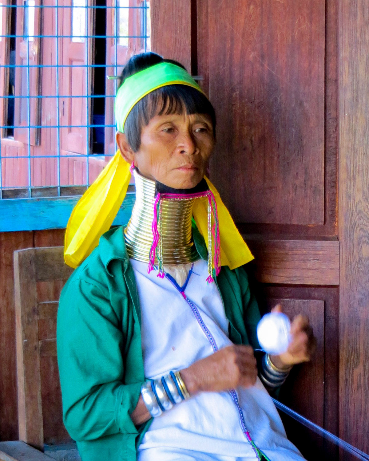 Woman with long neck in Inle Lake, Myanmar geo-portrait_©HowardWolff-4.jpg
