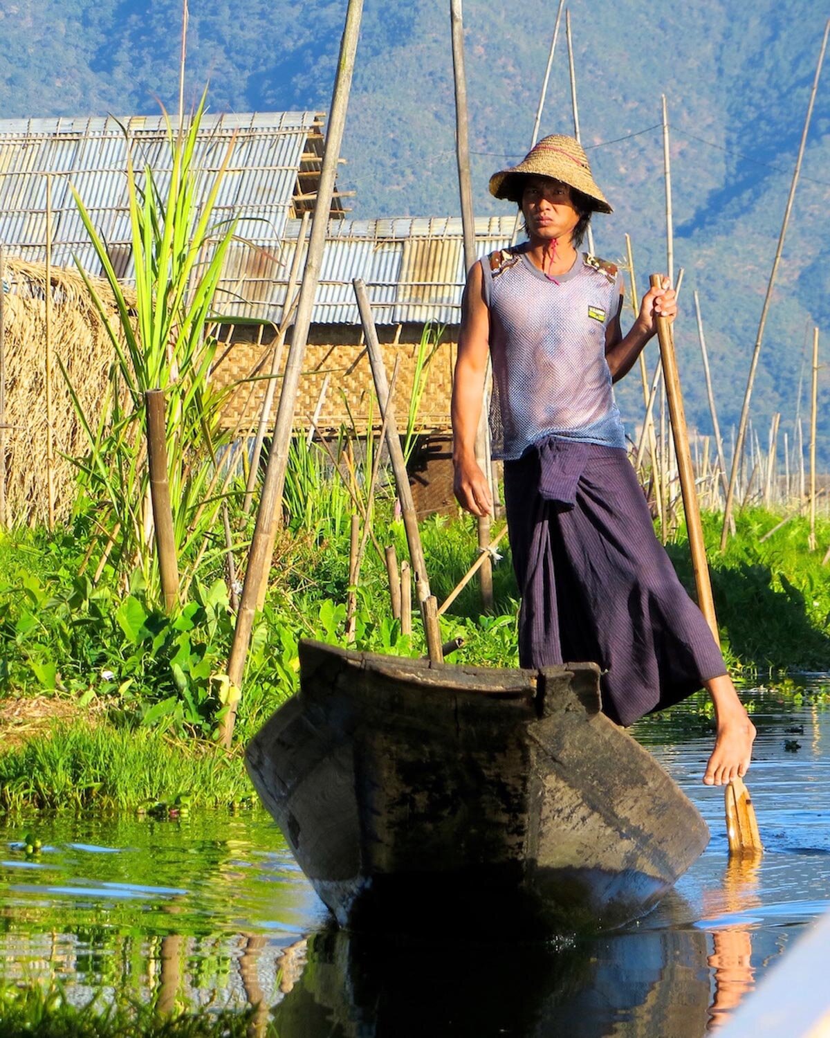 Paddling one-legged in Inle Lake, Myanmar geo-portrait_©HowardWolff-5.jpg