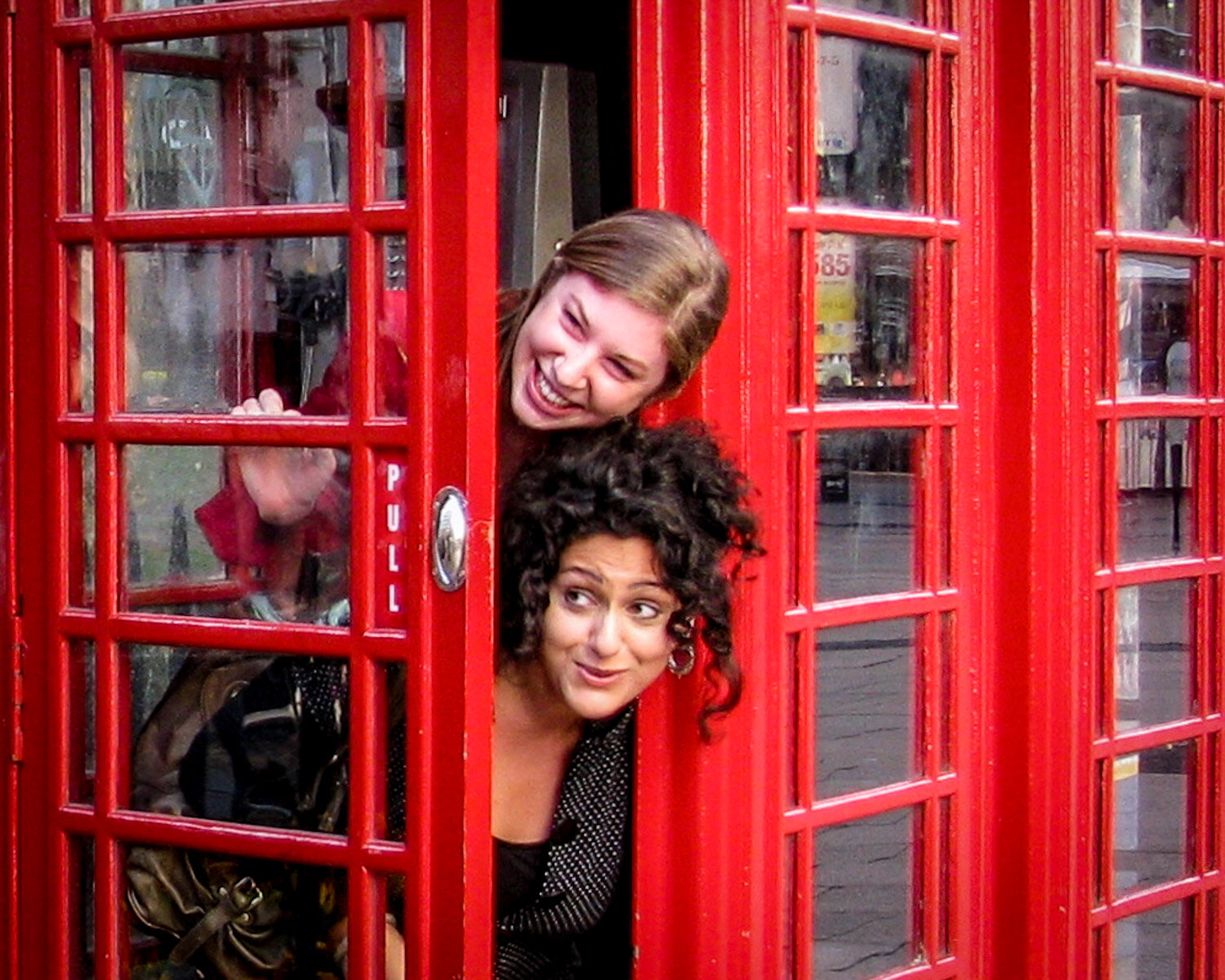 Girls in a London phone booth geo-portrait_©HowardWolff-1.jpg