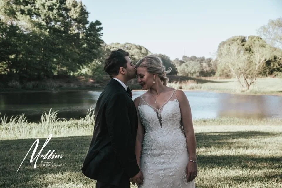 Stephanie&Grantunder in yard.jpg