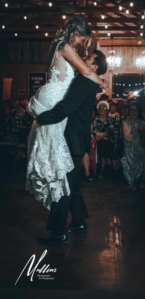 Grant holding Stephanie.jpg