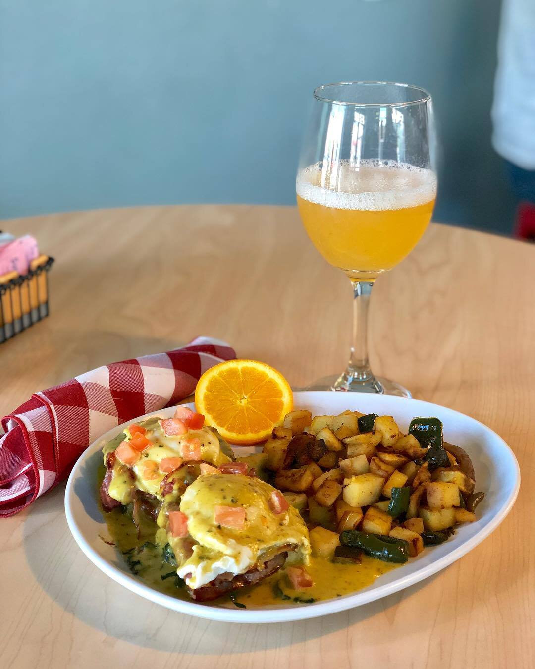 Italian Benedict is in town for one week only! Prosciutto, baby kale, and two poached eggs topped a with a made-from-scratch pesto hollandaise served over polenta cakes!