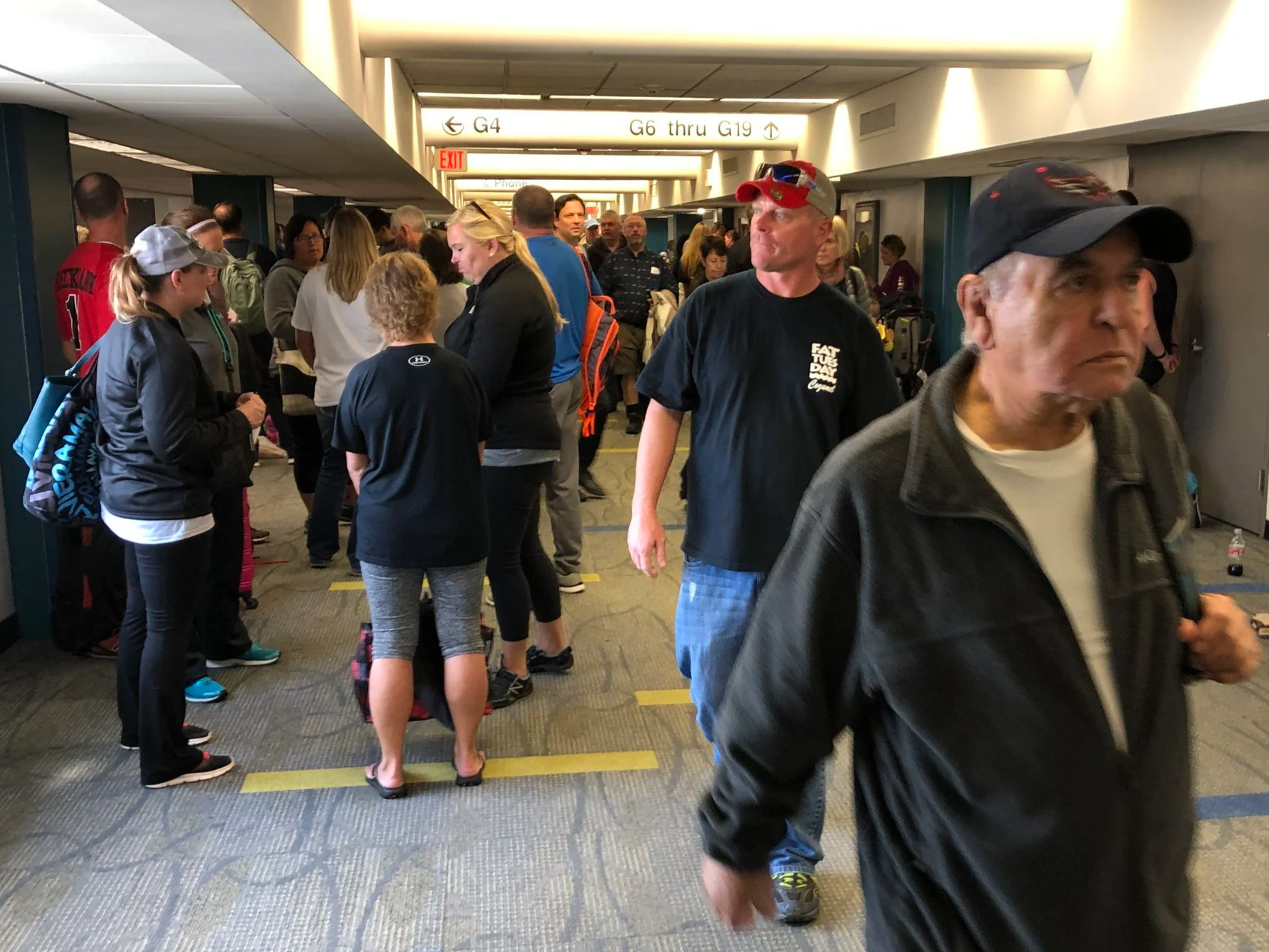 Passengers in overcrowded concourse