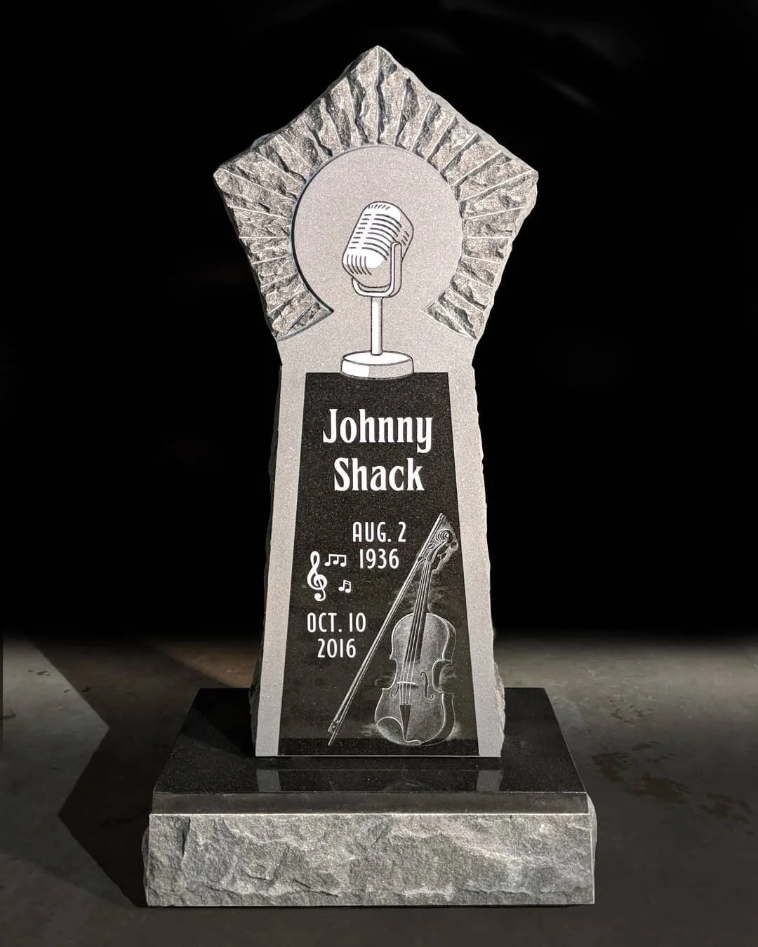 Johnny Shack's memorial.  Radio DJ and fiddle player.  The chiseled texture represents radio waves, fiddle etching by @dangarrisonart. 2018 - Small Monuments - The American Institute of Commemorative Art.
