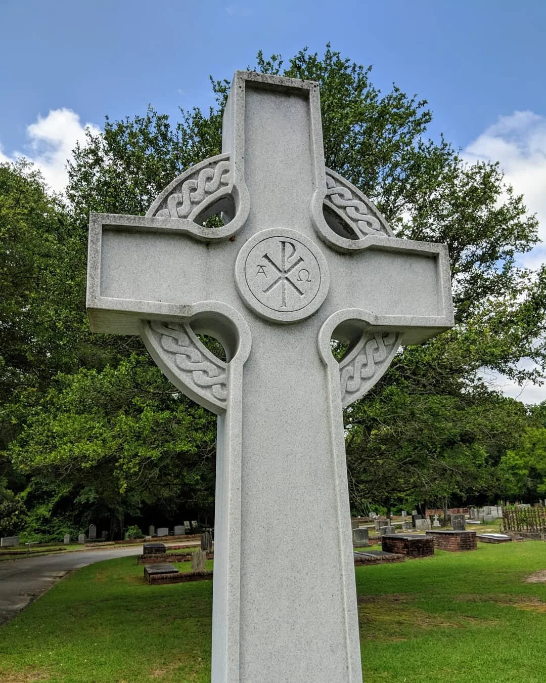 Detail of a cross for a family in Camden.