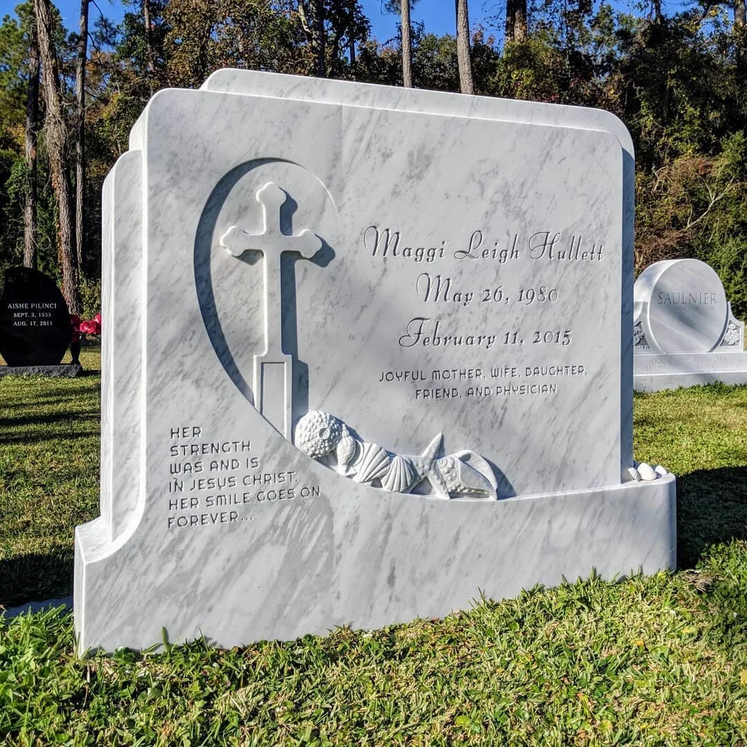 Maggi Hullett's memorial at Ocean Woods Cemetery in Myrtle Beach. White Carrara Marble.  2016_2nd place_Sculpture Monuments_The American Institute of Commemorative Art.