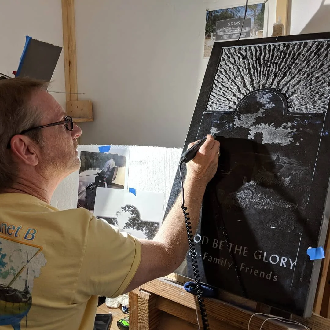 @dangarrisonart etching a beautiful scene into black granite