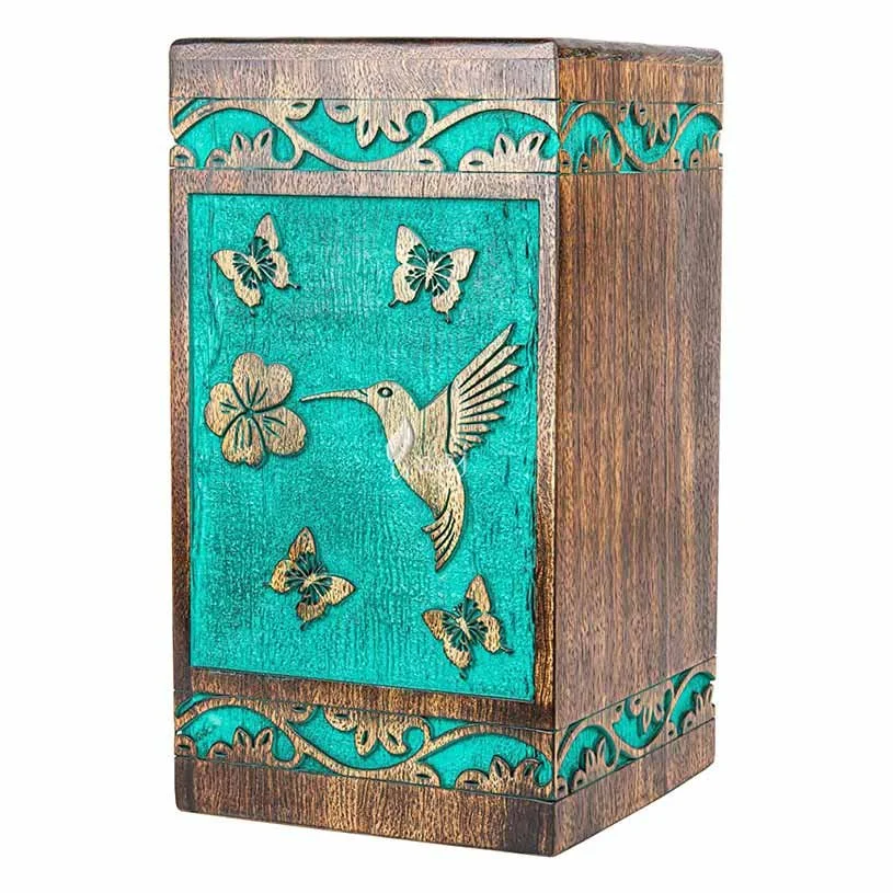 Hummingbird wood cremation urn with teal background