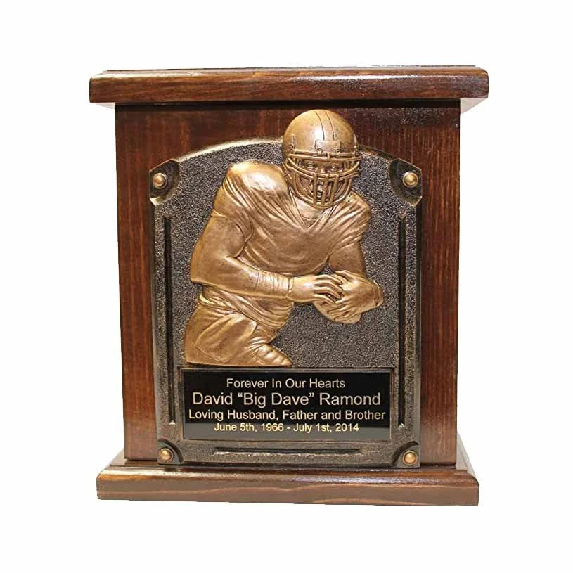 Wood urn for human ashes with a football player and plaque
