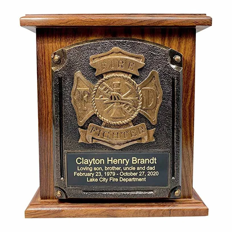 Wood cremation urn for human ashes with fire department plaque
