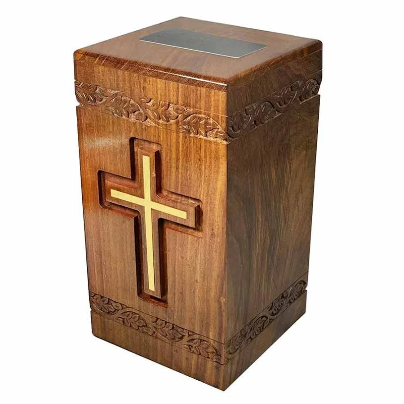 Wood urn for ashes with cross engraving