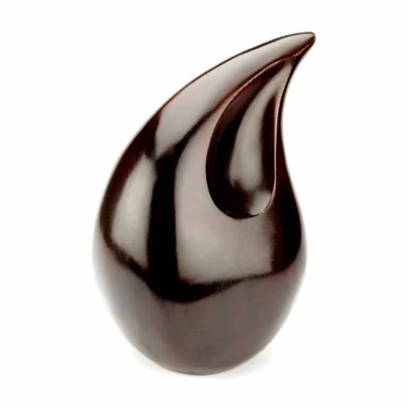 Modern urn for human ashes shaped like a tear drop