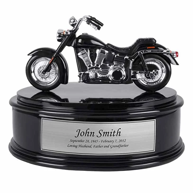 Cremation urn for human ashes shaped like a harley davidson motorcycle