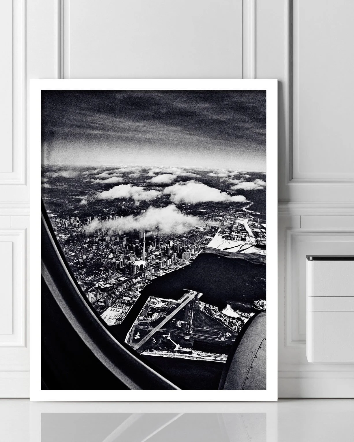 Looking down over the city and its ever-changing landscape, I immediately realized I had captured a special moment. The dramatic perspective places the downtown skyline, CN Tower, waterfront, and islands within a single frame, while the clouds create