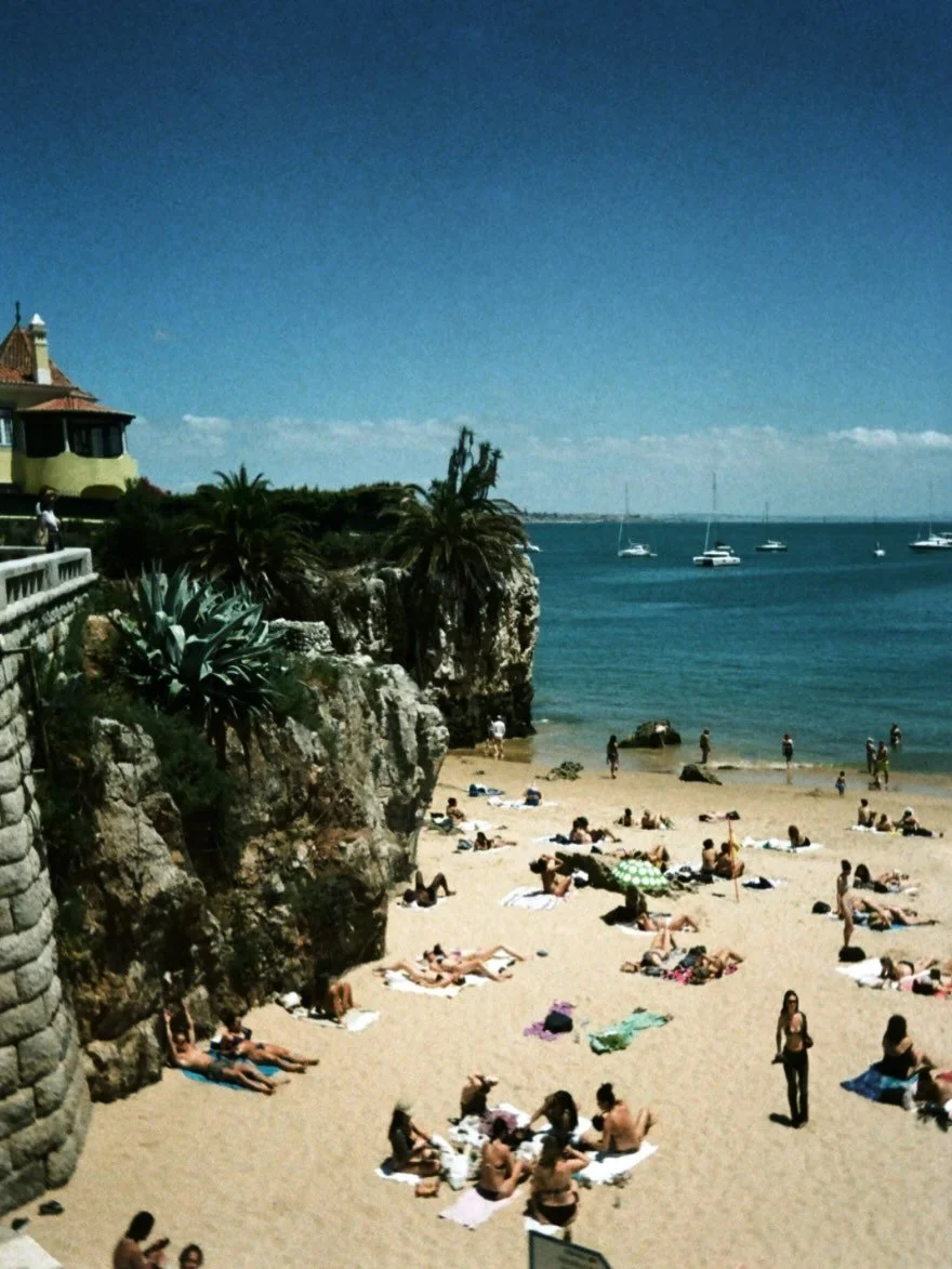 The last of three glimpses into a Portuguese summer&mdash;a moment held on film while life continues beyond the frame. Photographed this summer at Praia da Rainha in Cascais on colour negative film, this work carries the lingering feeling of days spe