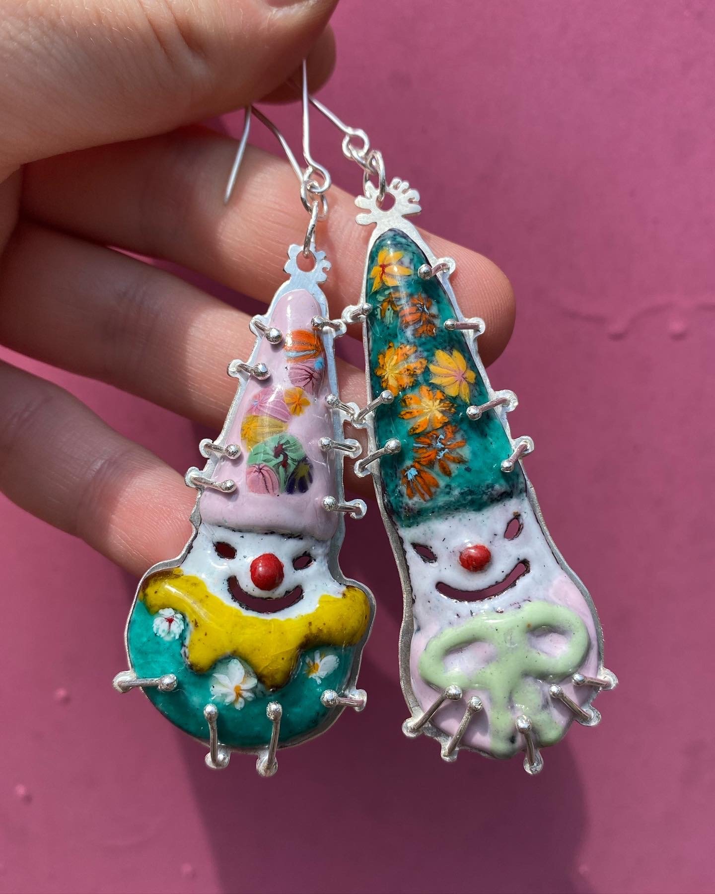 Clown earrings. 2023. Copper, enamel, silver. 2.5" x 1".