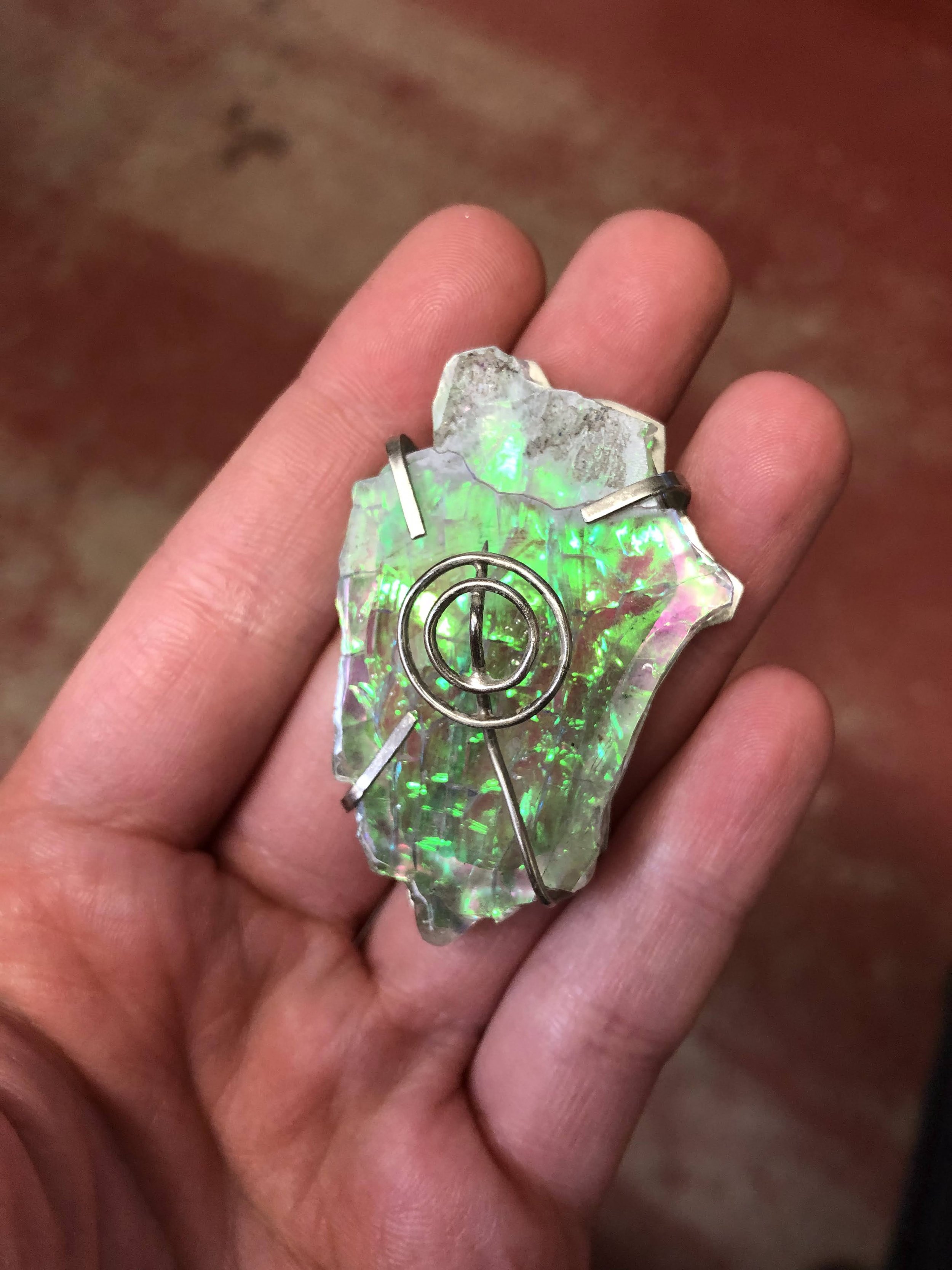Space brooch. 2020. Nickle Silver, found-objects. 1.5" x 2.5".
