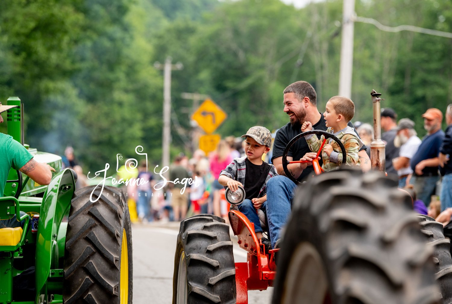 a tractor driver chats with another during the callicoon tractor parade in callicoon new york