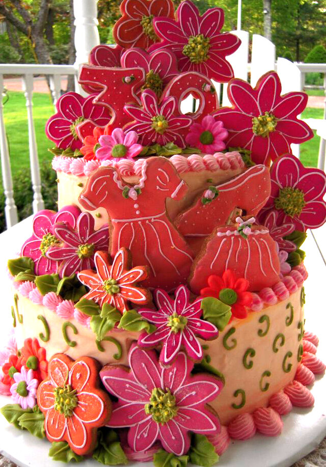 Birthday-cake-for-Junes-daughters-30th-birthday.-Flowers-dress-purse-and-shoes-are-cookies.jpg