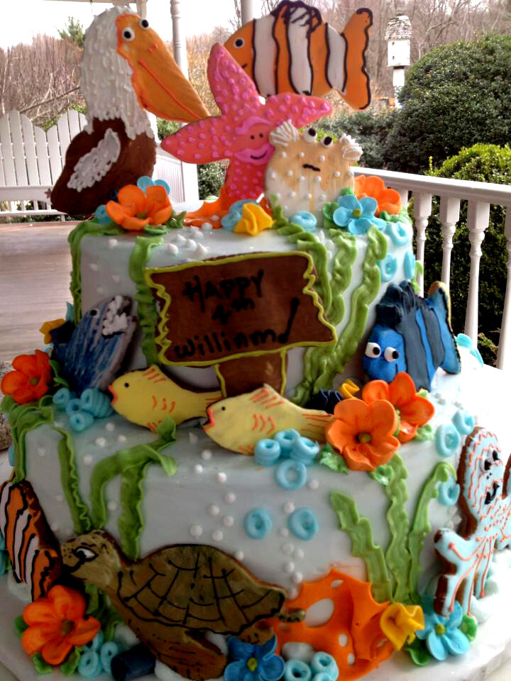 Finding-Nemo-birthday-cake.-This-little-boy-wanted-a-lot-of-characters-so-June-made-the-character-in-cookies.jpg