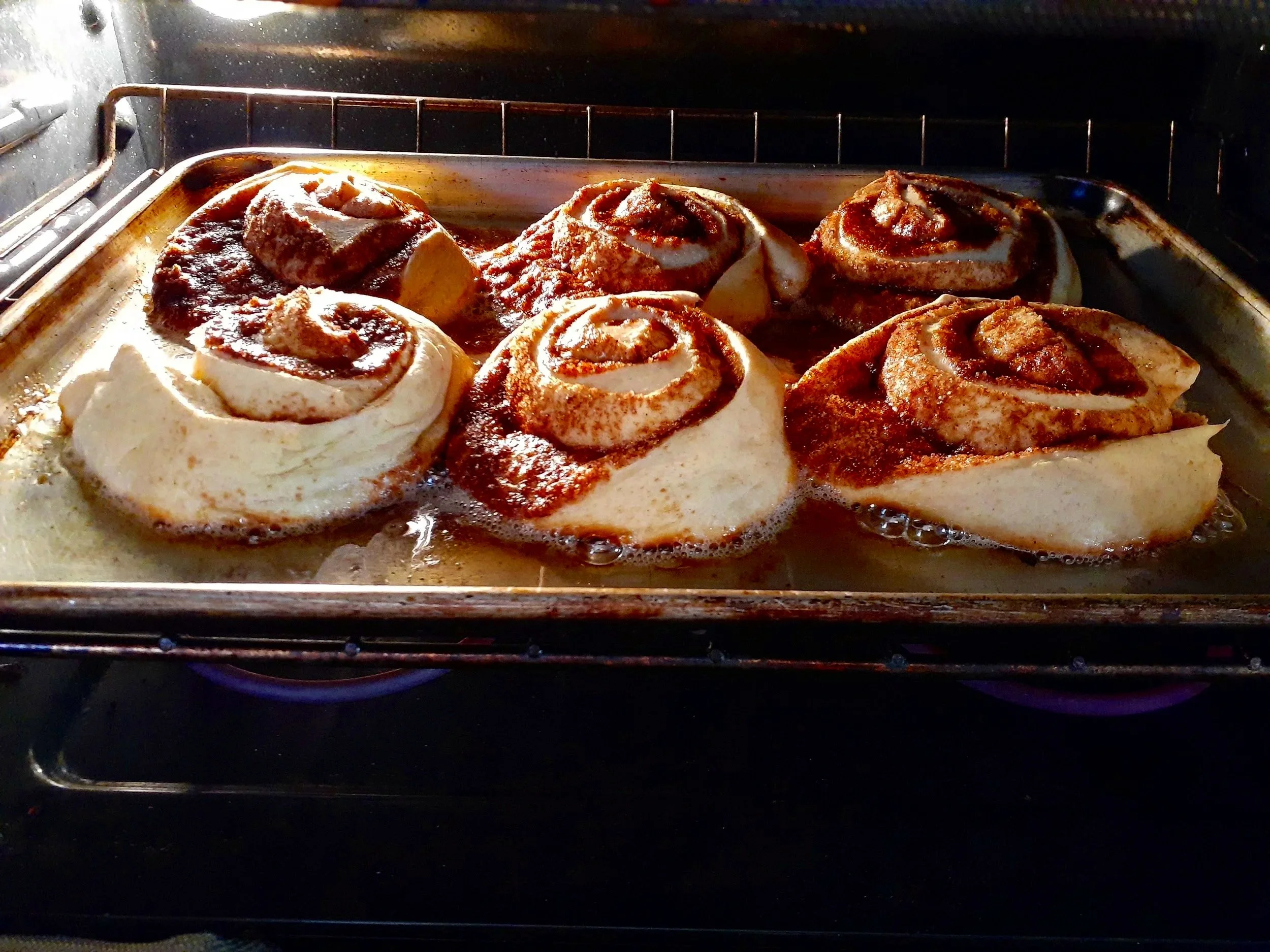 Cinnamon rolls baking in the oven